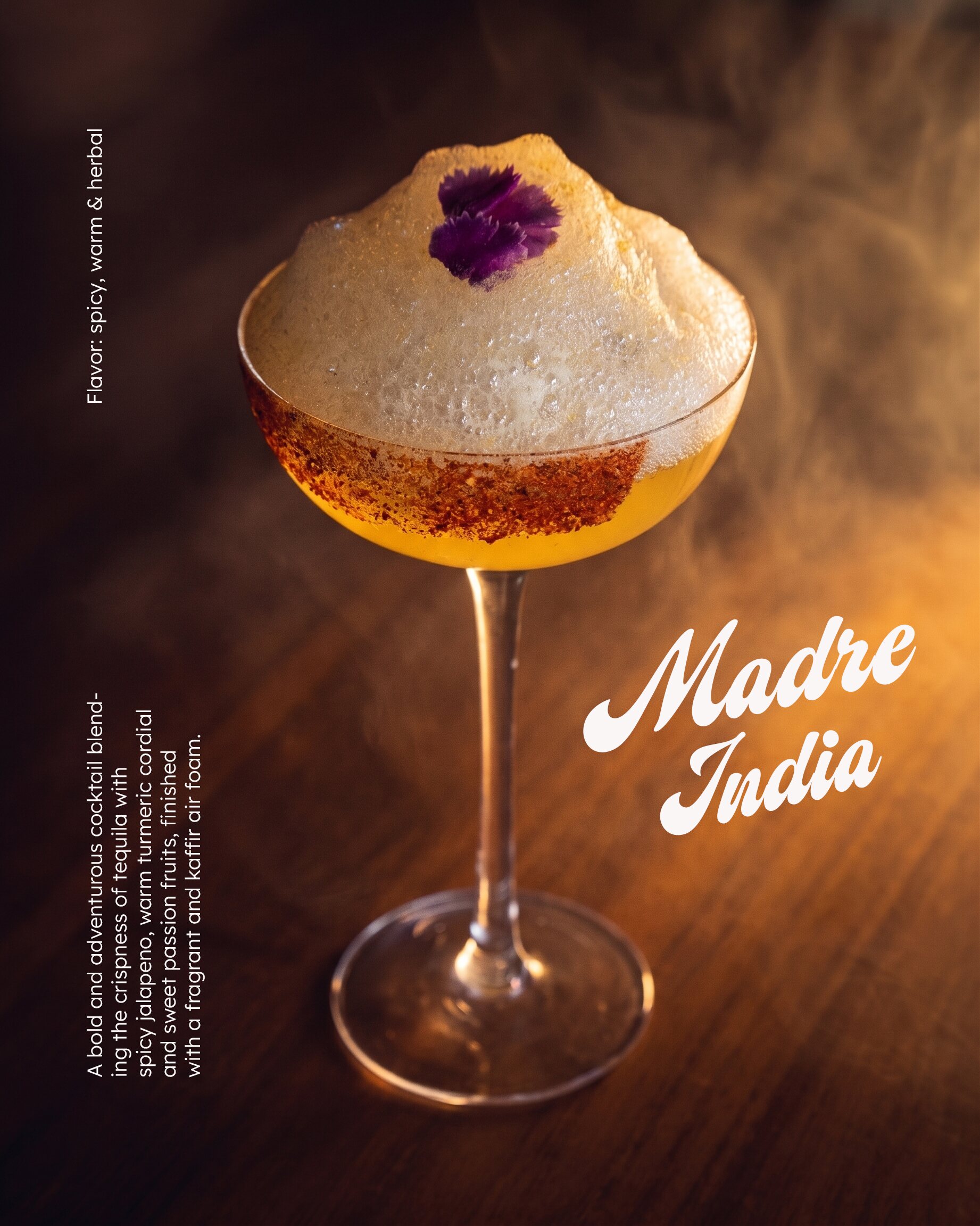 Madre India, a foamy coupe cocktail topped with a dried flower